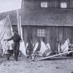 Photo from J.T. Studleys 1912 hunting memoir 
William N. (Bill) Dawson poses in either Kenai or Kasilof in 1898 with a collection of moose antlers and sheep horns  trophies from kills he had made in the Skilak Lake area.