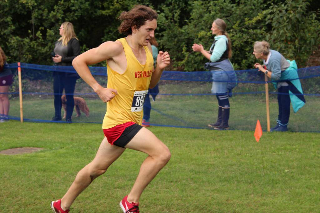 West Valley High Schools Shane Fisher races to victory at the 2022 Ted McKenney XC Running Invitational at Skyview Middle School on Saturday, Aug. 20, 2022 in Soldotna, Alaska. (Ashlyn OHara/Peninsula Clarion)