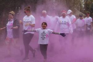 Peninsula Clarion file
Participants in the 2019 Stomp Out Stigma Color Run make their way through a haze of pink chalk at Soldotna Creek Park on Sept. 28, 2019.