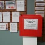 A box collects menstruation products for the Peninsula Period Network at the Soldotna Public Library on Tuesday, Aug. 23, 2022 in Soldotna, Alaska. (Ashlyn OHara/Peninsula Clarion)