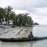 Susan Aramovich relaxes in her kayak on a tropical beach in this photo from Scott Burbanks Interior Waypoints. (Photo provided)