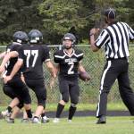 Nikiskis Dwyght Mullins celebrates a touchdown with teammates Saturday, Aug. 27, 2022, at Nikiski High School in Nikiski, Alaska. (Photo by Jeff Helminiak/Peninsula Clarion)