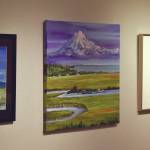 Jake Dye / Peninsula Clarion 
Artwork donated for the Harvest Auction hangs at the Kenai Art Center on Tuesday in Kenai.