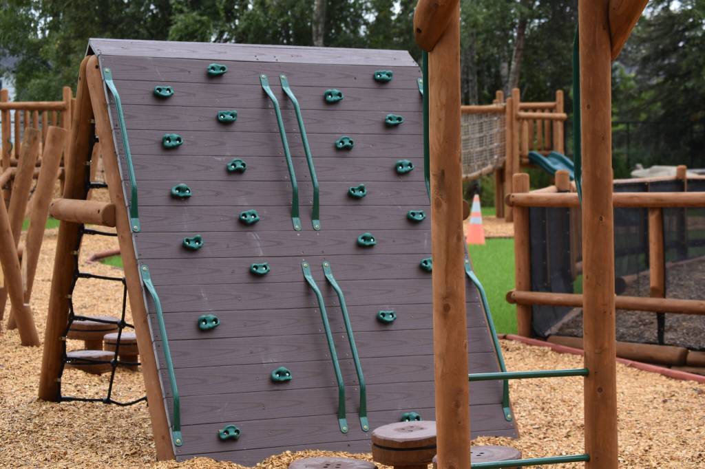 The playground at the Kahtnuhtana Duhdeldiht Campus features an agility course on Thursday, Sept. 1, 2022, in Kenai, Alaska. (Jake Dye/Peninsula Clarion)