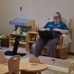 One of the educators for the toddler program at the Kahtnuhtana Duhdeldiht Campus prepares in a classroom on Thursday, Sept. 1, 2022, in Kenai, Alaska. (Jake Dye/Peninsula Clarion)
