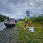 A state employee changes speed limit signs along the Sterling Highway. (Photos courtesy Alaska Department of Transportation & Public Facilities)