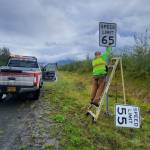 A state employee changes speed limit signs along the Sterling Highway. (Photos courtesy Alaska Department of Transportation & Public Facilities)