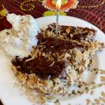 This German chocolate cake is rich and decadent and looks beautiful with a sparkling candle on top. (Photo by Tressa Dale/Peninsula Clarion)