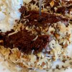 This German chocolate cake is rich and decadent and looks beautiful with a sparkling candle on top. (Photo by Tressa Dale/Peninsula Clarion)