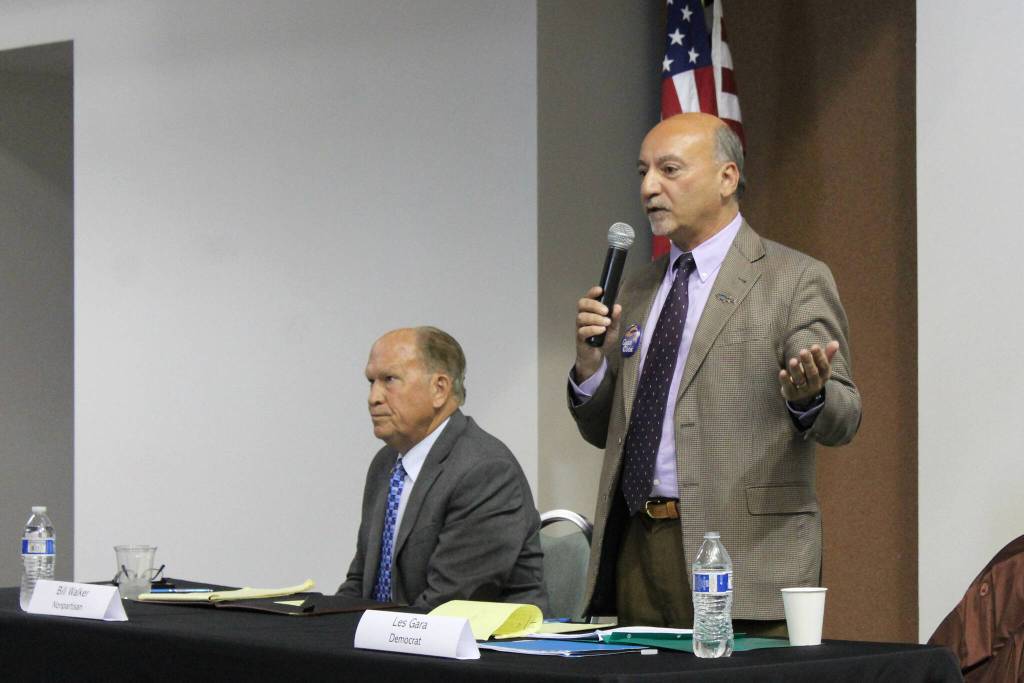 Alaska gubernatorial candidates Bill Walker, left, and Les Gara participate in a candidate forum hosted by the Kenai and Soldotna chambers of commerce at the Kenai Chamber of Commerce and Visitor Center on Wednesday, Sept. 7, 2022, in Kenai, Alaska. (Ashlyn OHara/Peninsula Clarion)