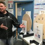 Kenai Mayor Brian Gabriel spins a wheel to determine the Magic Weight at the Kenai Silver Salmon Derby on Tuesday, Sept. 15, 2020, at Three Bears grocery store in Kenai, Alaska. (Photo by Jeff Helminiak/Peninsula Clarion)