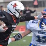 Kenai Centrals Luke Armstrong returns an interception against Kodiaks Daniel Edwards on Saturday, Sept. 10, 2022, at Ed Hollier Field at Kenai Central High School in Kenai, Alaska. (Photo by Jeff Helminiak/Peninsula Clarion)