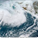 This image provided by the National Hurricane Center and Central Pacific Hurricane Center/National Oceanic and Atmospheric Administration shows a satellite view over Alaska, Thursday, Sept. 15, 2022. A vast swath of western Alaska could see flooding and high winds as the remnants of Typhoon Merbok move toward the Bering Sea region. The National Weather Service had in place coastal flood warnings, beginning Friday, spanning from parts of the Yukon Delta in southwest Alaska up to St. Lawrence Island in the Bering Sea and to the Bering Strait coast. (NOAA via AP)
