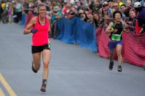 Palmers Christy Marvin and Palmers Meg Inokuma race in the Mount Marathon Race in Seward on July 4, 2022. (Photo by Jeff Helminiak/Peninsula Clarion)