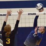 Soldotnas Sadie Lane attacks on Sewards Robin Cronin on Tuesday, Sept. 20, 2022, at Soldotna High School in Soldotna, Alaska. (Photo by Jeff Helminiak/Peninsula Clarion)