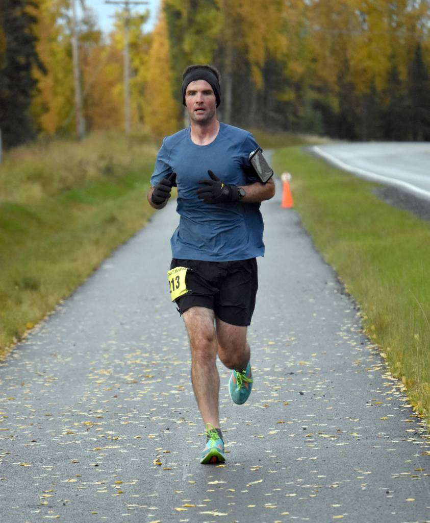 Lee Frey runs to victory in the mens half marathon at the Kenai River Marathon on Sunday, Sept. 25, 2022, in Kenai, Alaska. (Photo by Jeff Helminiak/Peninsula Clarion)