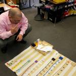 Soldotna Montessori Charter School Principal John DeVolld explains Montessori materials in a classroom at Soldotna Montessori Charter School on Tuesday, Sept. 20, 2022, in Soldotna, Alaska. (Ashlyn OHara/Peninsula Clarion)