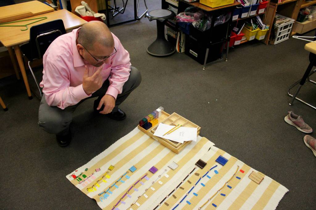 Soldotna Montessori Charter School Principal John DeVolld explains Montessori materials in a classroom at Soldotna Montessori Charter School on Tuesday, Sept. 20, 2022, in Soldotna, Alaska. (Ashlyn OHara/Peninsula Clarion)