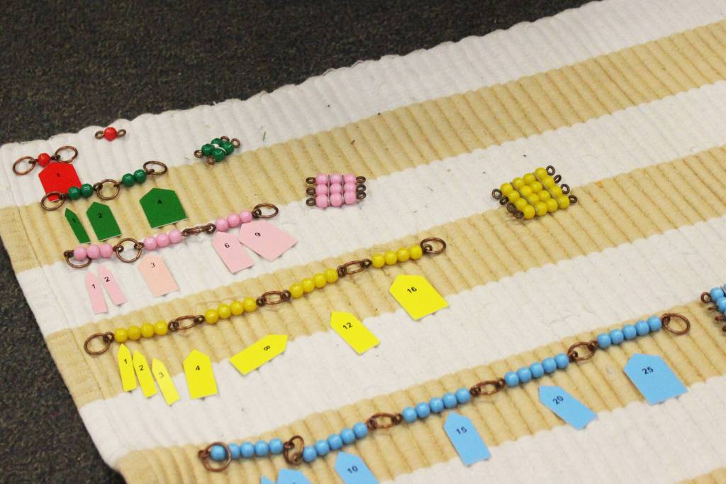 Montessori materials rest on the floor of a classroom at Soldotna Montessori Charter School on Tuesday, Sept. 20, 2022, in Soldotna, Alaska. (Ashlyn OHara/Peninsula Clarion)