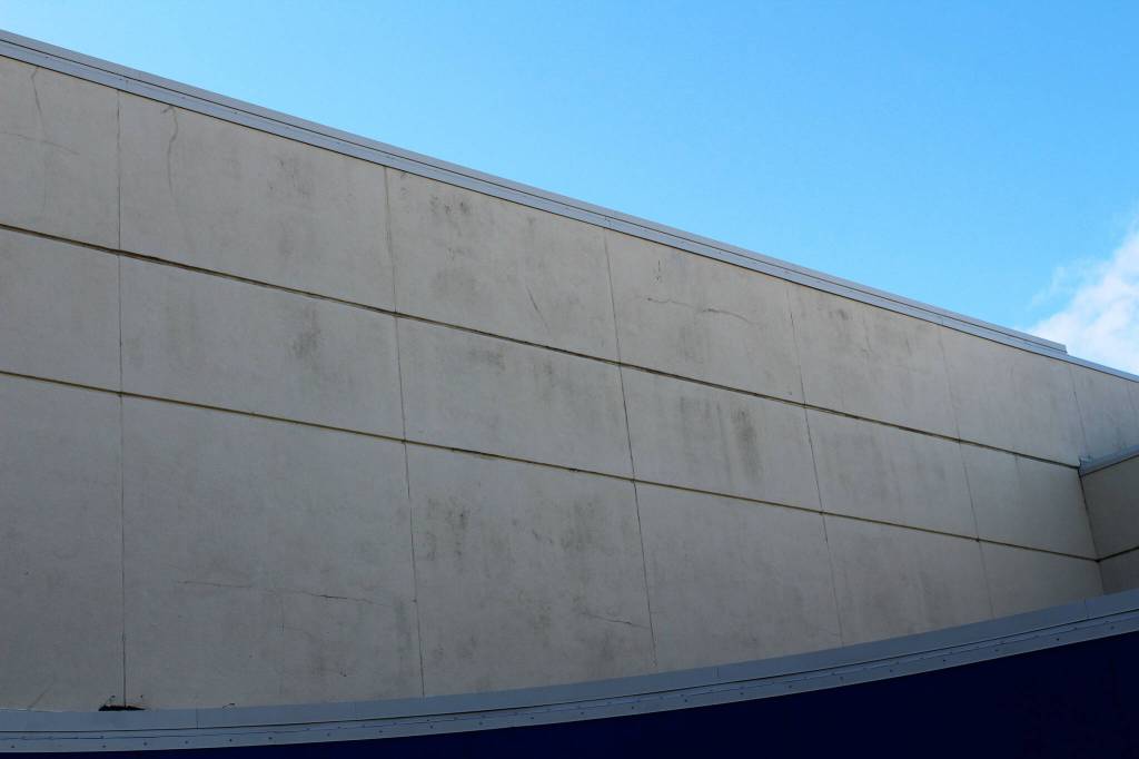 Cracks split the siding outside of Soldotna High School on Tuesday, Sept. 27, 2022, in Soldotna, Alaska. The siding is one of several projects in a bond package Kenai Peninsula voters will consider during the Oct. 4 municipal election. (Ashlyn OHara/Peninsula Clarion)