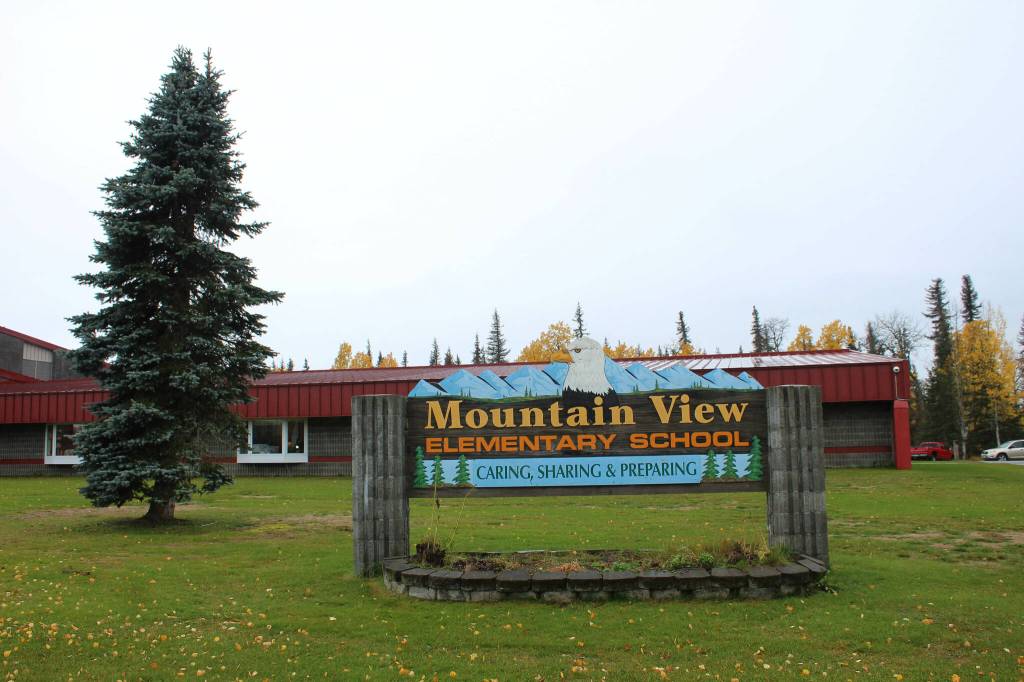 Fall leaves surround the welcome sign at Mountain View Elementary School on Thursday, Sept. 29, 2022, in Kenai, Alaska. (Ashlyn OHara/Peninsula Clarion)