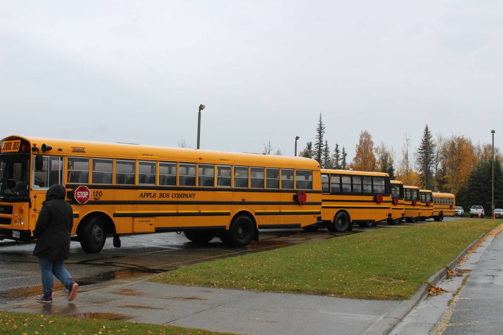 Buses line up ahead of dismissal at Mountain View Elementary School on Thursday, September 29, 2022, in Kenai, Alaska. A bond package up for consideration by Kenai Peninsula Borough voters on Oct. 4 would fund improvements to the schools traffic flow. (Ashlyn OHara/Peninsula Clarion)