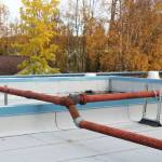 Natural gas pipes, used to for heating, are anchored to the outside of Soldotna Elementary School on Friday, Sept. 30, 2022, in Soldotna, Alaska. (Ashlyn OHara/Peninsula Clarion)