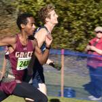 Grace Christians David Sliwinski and Homers Seamus McDonough both make their last push to the finish chute during the Region 3/Division II race on Saturday, Oct. 1, 2022, at Tsalteshi Trails just outside of Soldotna Alaska. (Jake Dye/Peninsula Clarion)