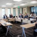 Melanie Hardin, right, greets the Alaska Permanent Fund Corp.s Board of Trustees before her interview for the APFCs executive directors job Monday, Oct. 3, 2022, in Juneau, (Mark Sabbatini / Juneau Empire)