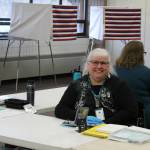 Kathy Carson helps run a polling location at the Soldotna Regional Sports Complex on Tuesday, Oct. 4, 2022, in Soldotna, Alaska. (Ashlyn OHara/Peninsula Clarion)