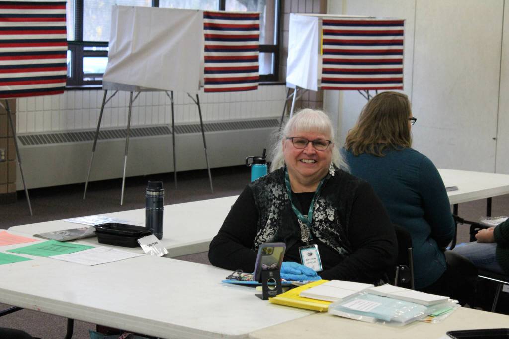 Kathy Carson helps run a polling location at the Soldotna Regional Sports Complex on Tuesday, Oct. 4, 2022, in Soldotna, Alaska. (Ashlyn OHara/Peninsula Clarion)