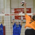 Soldotnas Hallie Fischer and Sadie Lane set up a block on Kenai Centrals Emma Beck on Tuesday, Sept. 4, 2022, at Kenai Central High School in Kenai, Alaska. (Photo by Jeff Helminiak/Peninsula Clarion)