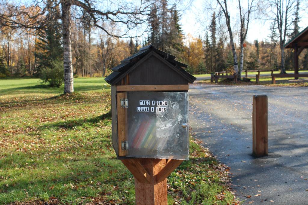 A mini-library contains books at Kenai Municipal Park on Monday, Oct. 3, 2022, in Kenai, Alaska. (Ashlyn OHara/Peninsula Clarion)