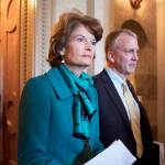 Sen. Lisa Murkowski, R-Alaska, left, and Sen. Dan Sullivan, R-Alaska, leave the chamber after a vote on Capitol Hill in Washington on May 10, 2017. Two Russians who said they fled the country to avoid compulsory military service have requested asylum in the U.S. after landing on a remote Alaskan island in the Bering Sea, Alaska U.S. Sen. Lisa Murkowskis office said Thursday, Oct. 6, 2022. (AP Photo/J. Scott Applewhite, File)