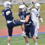 Zac Buckbee and Joe Whittom celebrate after Buckbees touchdown run in the first quarter Friday, Oct. 7, 2022, at Justin Maile Field at Soldotna High School in Soldotna, Alaska. (Photo by Jeff Helminiak/Peninsula Clarion)
