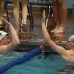 Soldotnas Benn Abel and Derrick Jones celebrate after swimming the 50-yard freestyle at the SoHi Pentathlon on Friday, Oct. 7, 2022, at Soldotna High School in Soldotna, Alaska. (Jake Dye/Peninsula Clarion)