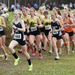 Chugiaks Campbell Peterson and Soldotnas Sophia Jedlicki lead the Division I girls race at the state cross-country meet Saturday, Oct. 8, 2022, at Bartlett High School in Anchorage, Alaska. (Photo by Jeff Helminiak/Peninsula Clarion)