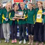 The Seward girls won the Division II team title at the state cross-country meet Saturday, Oct. 8, 2022, at Bartlett High School in Anchorage, Alaska. (Photo by Jeff Helminiak/Peninsula Clarion)
