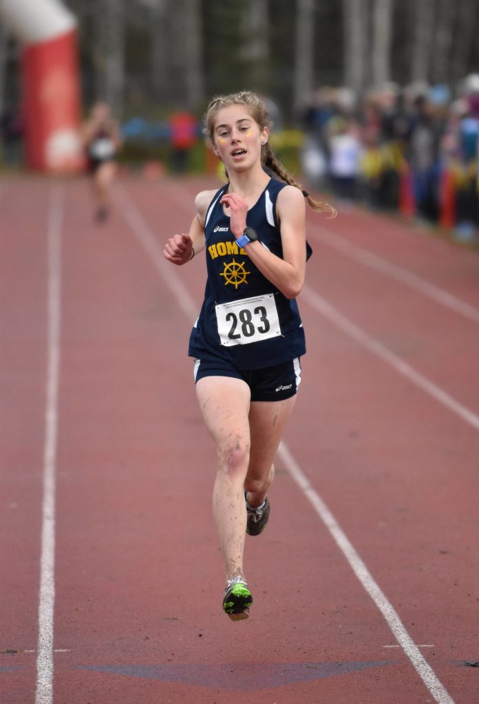 Homers Daisy Walker takes sixth in the Division II girls race at the state cross-country meet Saturday, Oct. 8, 2022, at Bartlett High School in Anchorage, Alaska. (Photo by Jeff Helminiak/Peninsula Clarion)
