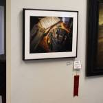 Evening Jam with Chuck by Susan Biggs, hangs with its second place ribbon during the opening reception of the Kenai Art Center Biennial Juried Show on Thursday, Oct. 6, 2022, at the Kenai Art Center in Kenai, Alaska. (Jake Dye/Peninsula Clarion)