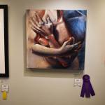Cross My Heart, by Celia Carl Anderson, hangs with its Best of Show ribbon during the opening reception of the Kenai Art Center Biennial Juried Show on Thursday, Oct. 6, 2022, at the Kenai Art Center in Kenai, Alaska. (Jake Dye/Peninsula Clarion)