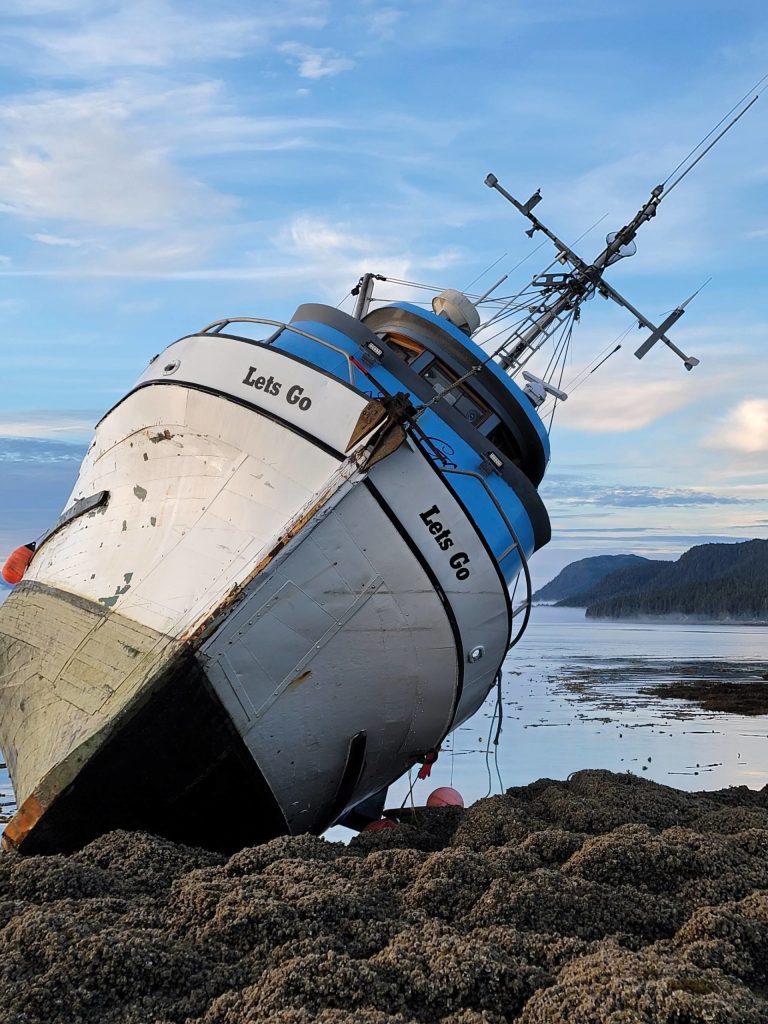 A 60-foot fishing vessel was grounded in Favorite Reef on Thursday evening into Friday morning when three passengers were safely rescued off the boat by JPD Chief Ed Mercer. The Coast Guard continues to monitor the ship while crews work to safely defuel it. (Courtesy Photo / Gregory Chaney)
