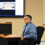 Oregon Accreditation Alliance Executive Director Scott Hayes, monitor, and Kenai Police Chief David Ross, right, field questions from the Kenai City Council regarding the departments accreditation during a council meeting on Wednesday, Oct. 5, 2022, in Kenai, Alaska. (Ashlyn OHara/Peninsula Clarion)