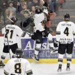 Kenai Rivers Nick Stevens celebrates scoring his teams first home goal of the season Friday, Oct. 14, 2022, against the Fairbanks Ice Dogs at the Soldotna Regional Sports Complex in Soldotna, Alaska. Jack Anderson and Caleb Huffman look on. (Photo by Jeff Helminiak/Peninsula Clarion)