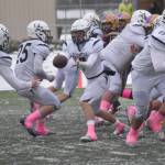 Soldotna's Zac Buckbee pitches to Collin Peck for a touchdown run Saturday, Oct. 15, 2022, in the Division II state championship game at Service High School in Anchorage, Alaska. (Photo by Jeff Helminiak/Peninsula Clarion)