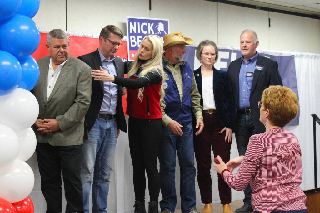 Alaskan Republican political candidates pose for a group photo at a Get Out the Vote rally at the Soldotna Regional Sports Complex on Tuesday, Oct. 19, 2022, in Soldotna, Alaska. From left: Gubernatorial candidate Charlie Pierce; U.S. House candidate Nick Begich III; U.S. Senate candidate Kelly Tshibaka; Alaska House Reps. Ron Gillham and Sarah Vance; and Alaska Senate candidate Tuckerman Babcock. (Ashlyn OHara/Peninsula Clarion)
