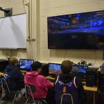 From left, Alternate Bodie Chumley, Graehm LeFevre, Dalton Schanrock and Bryce LeFevre and Coach Jonus Kaponus Angleton compete in SoHi's Rocket League match against Thunder Mountain High School on Thursday, Oct. 20, 2022 at Skyview Middle School in Soldotna, Alaska. (Jake Dye/Peninsula Clarion)