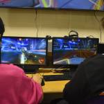 Dalton Schanrock maintains possession of the ball while Bryce LeFevre hangs back in goal during SoHi's Rocket League match against Thunder Mountain on Thursday, Oct. 20, 2022 in Soldotna, Alaska. (Jake Dye/Peninsula Clarion)