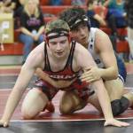 Kenai Centrals Andrew Gaethle and Soldotnas Isaac Chavarria wrestle at 152 pounds at the Luke Spruill Memorial Tournament on Saturday, Oct. 22, 2022, at Kenai Central High School in Kenai, Alaska. Chavarria won by technical fall. (Photo by Jeff Helminiak/Peninsula Clarion)