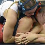 Soldotna's Daisy Hannevold wrestles with Kenai Central's Jalyn Yeoman at girls 138 pounds at the Luke Spruill Memorial Tournament on Saturday, Oct. 22, 2022, at Kenai Central High School in Kenai, Alaska. Hannevold was able to pin Yeoman. (Photo by Jeff Helminiak/Peninsula Clarion)